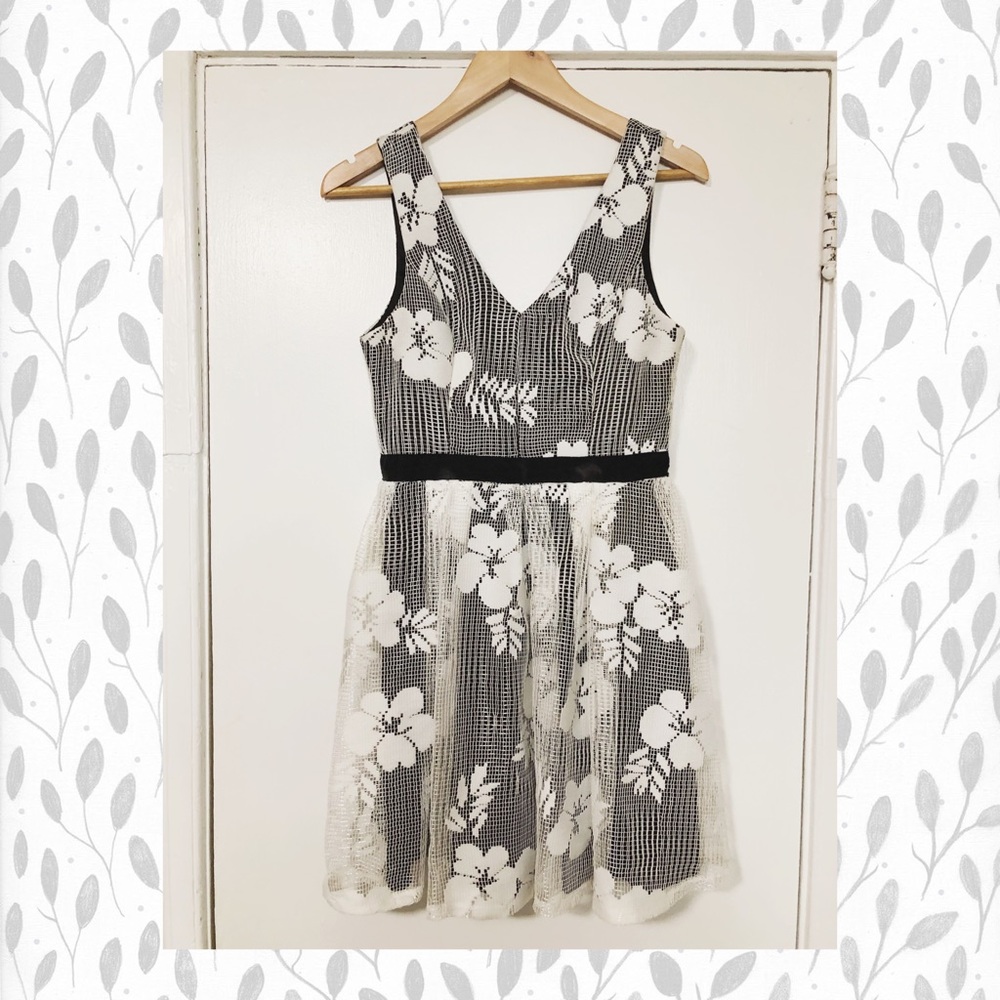Floral lace over black dress